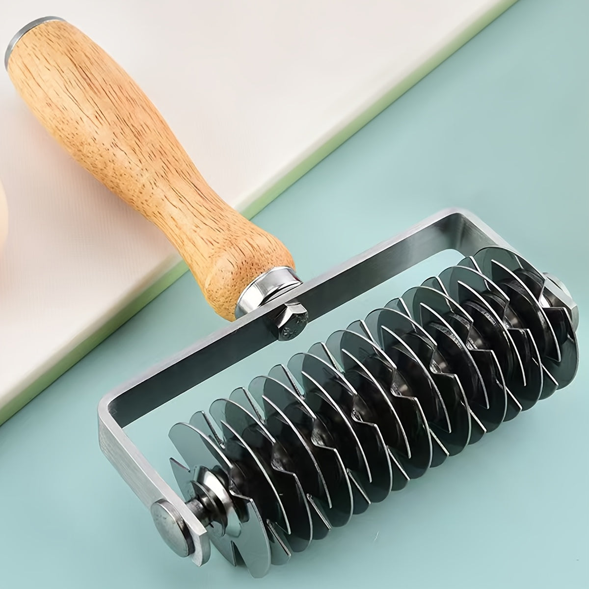 Stainless steel leather mesh roller knife